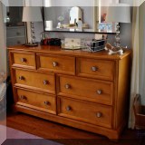 F55. Home Furniture double dresser. 35”h x 56”w x 18”d 